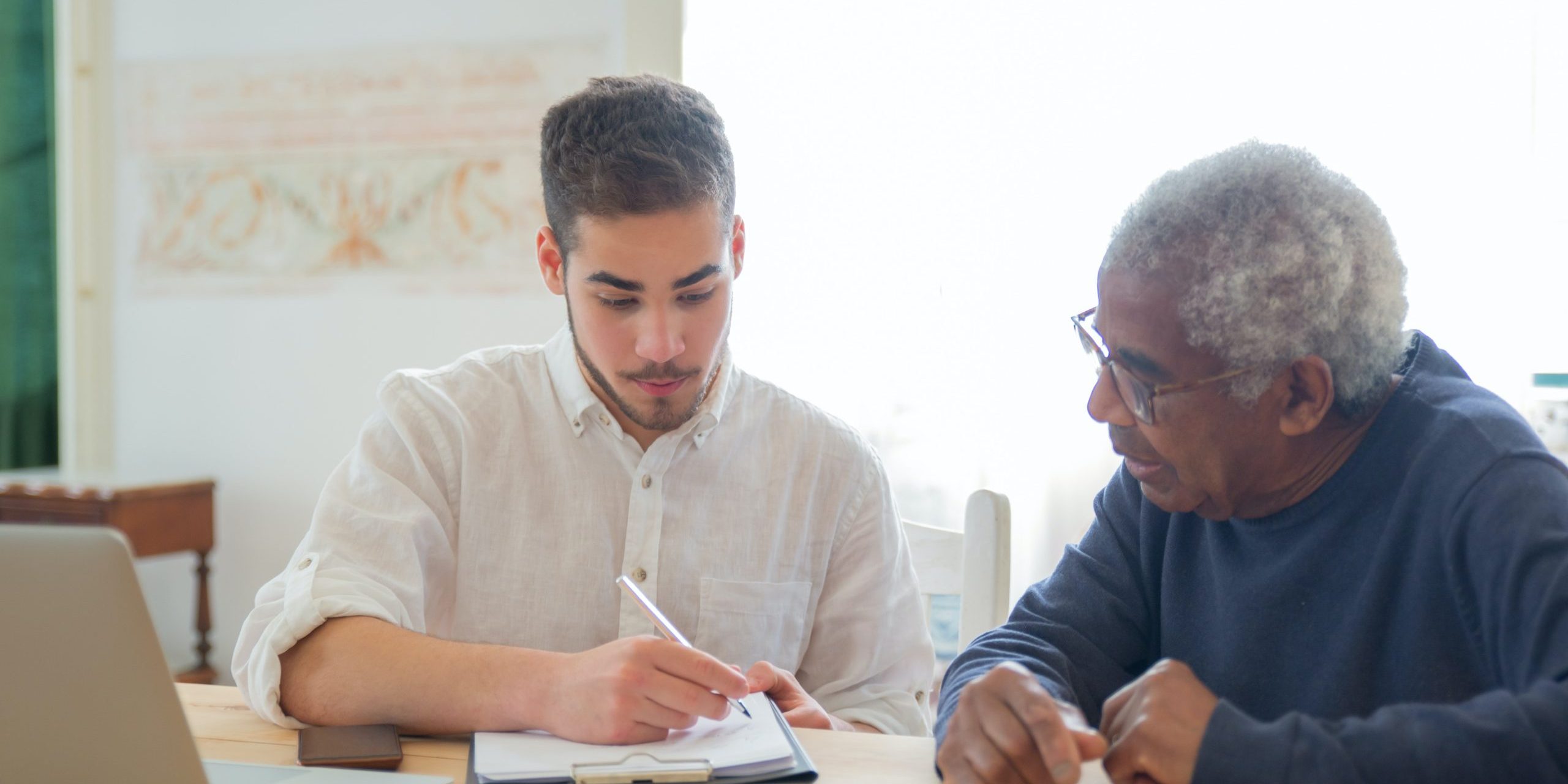 pexels-kampus-production-7551637 A social worker assisting an elderly client.
